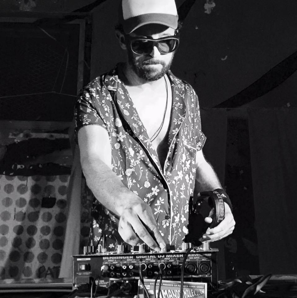 A night set, in black and white, with a hand on the mixer